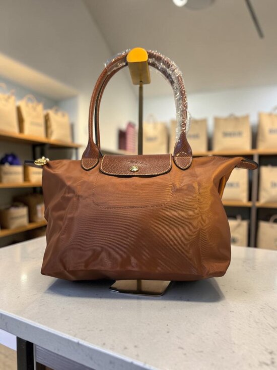 The Unbranded Brand Handbags - SALE!! New Foldable Cognac Colored Medium Tote in Nylon  NWT